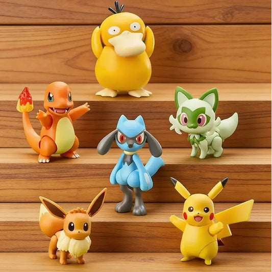 Set of six colorful cartoon character figurines on a wooden surface