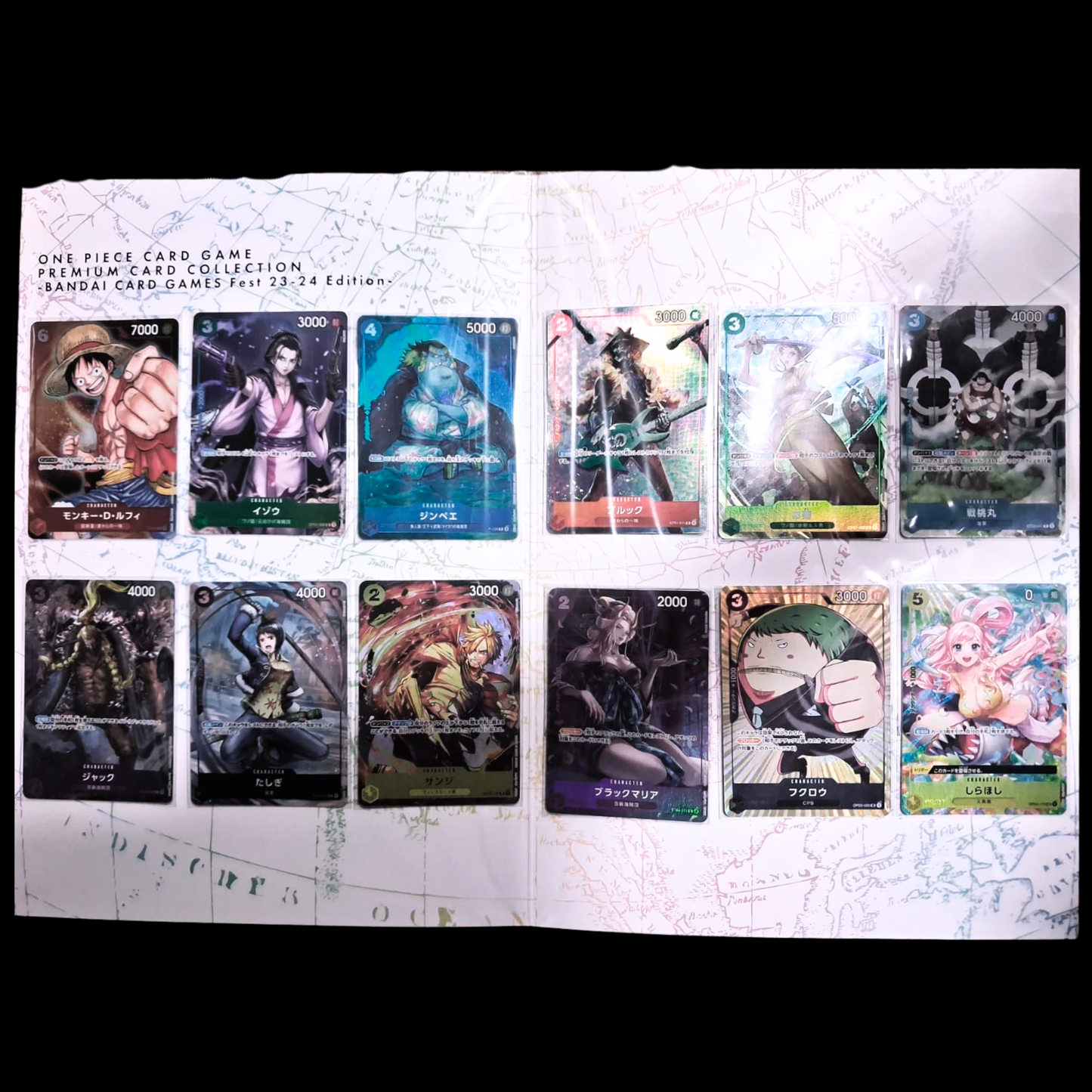 Collection of 'One Piece' themed trading cards in a binder