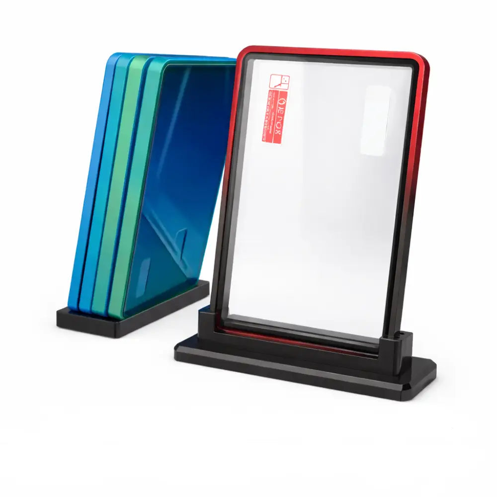 Multicolor gradient aluminum alloy 35PT PSA and CGC graded card holders in red, blue, and green finishes with black display stands by TCGVault.