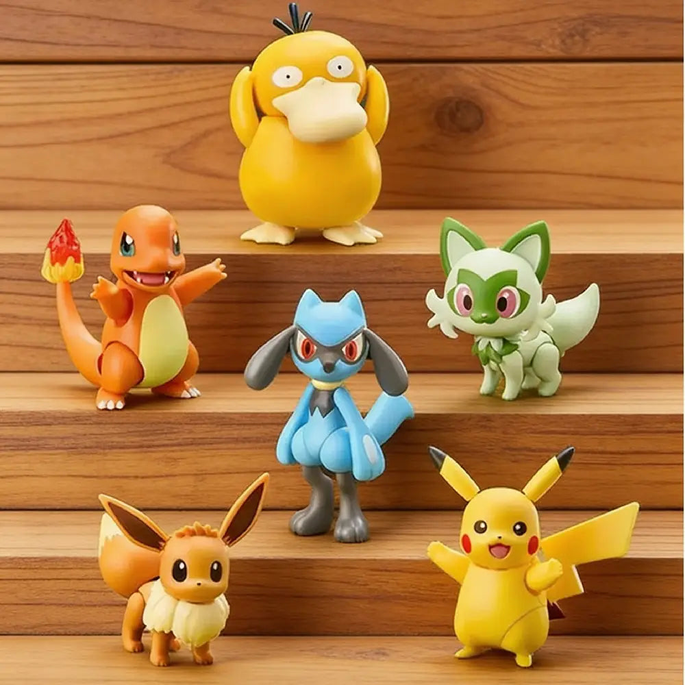 Set of six colorful cartoon character figurines on a wooden surface