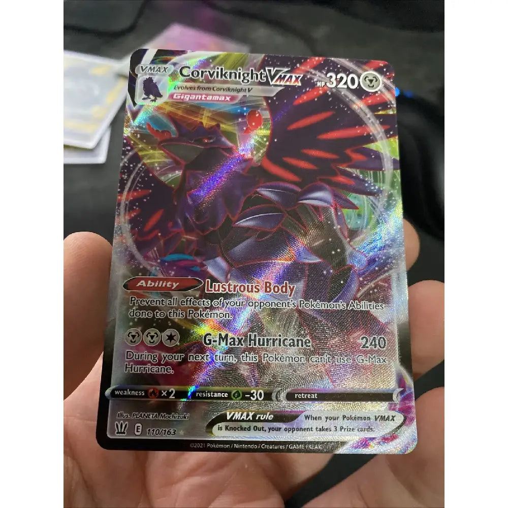 Corviknight VMAX Full Art #110 Battle Styles Pokémon card holographic close-up held in hand